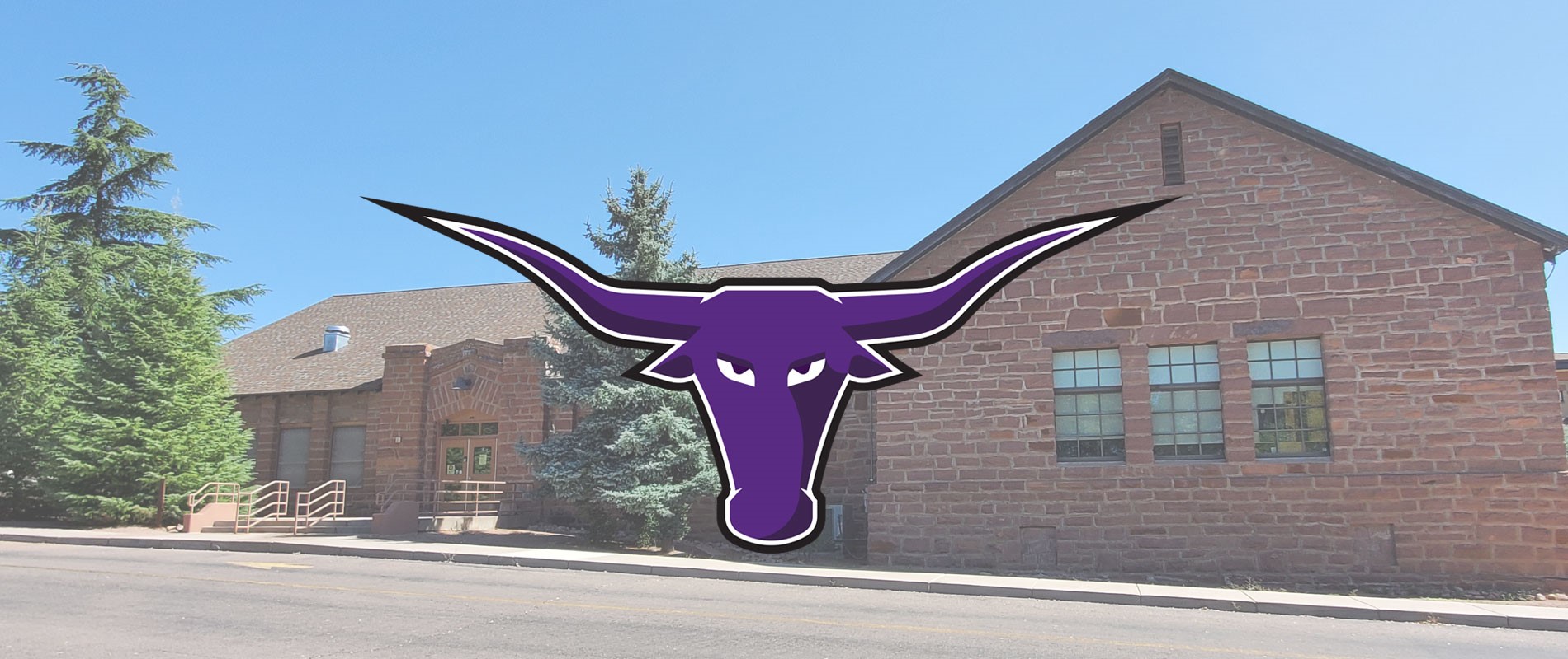 District building with longhorn logo